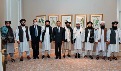 王毅在多哈会见阿富汗塔利班 专家：双方就打击“东伊运”等反恐问题的表态都更进一步